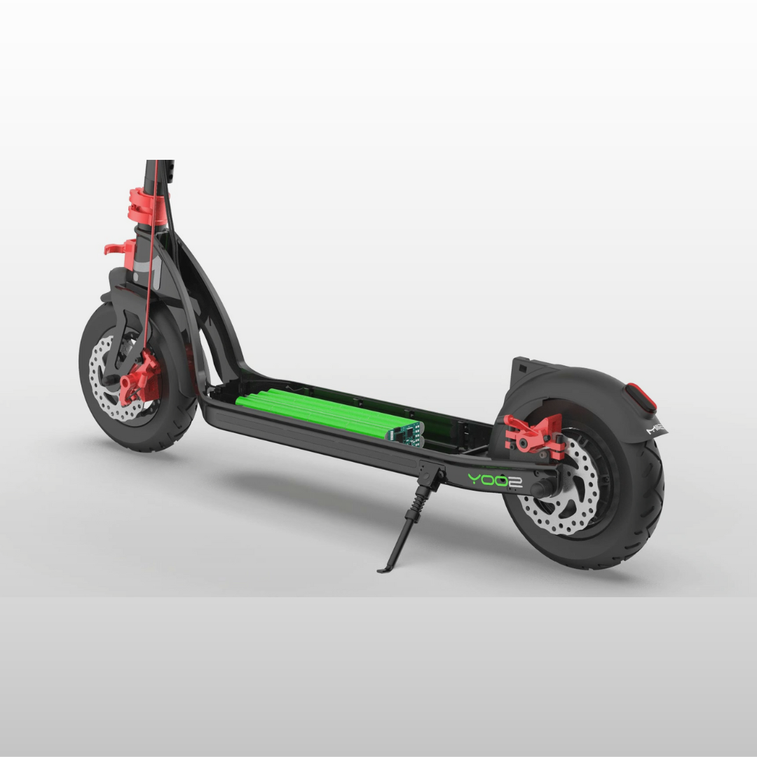 Lower portion of electric scooter with top of the deck removed to display the scooter's battery.